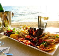 Waves on the Beach - Book Restaurant