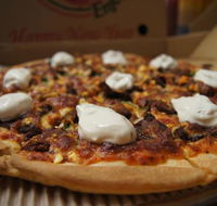 Nyojo's Pizza - Book Restaurant