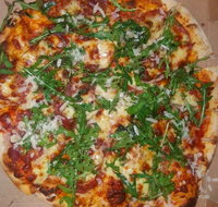 Caruso's Woodfired Pizzeria - Book Restaurant