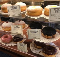 Daily Planet Cafe - Book Restaurant