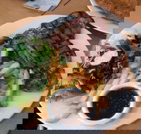 Courtyard Bistro - Uncle Buck's Hotel - Book Restaurant