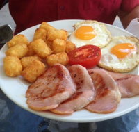 Smiley Piggy Cafe - Book Restaurant