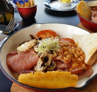 de Millaa's Coffee Shop - Book Restaurant
